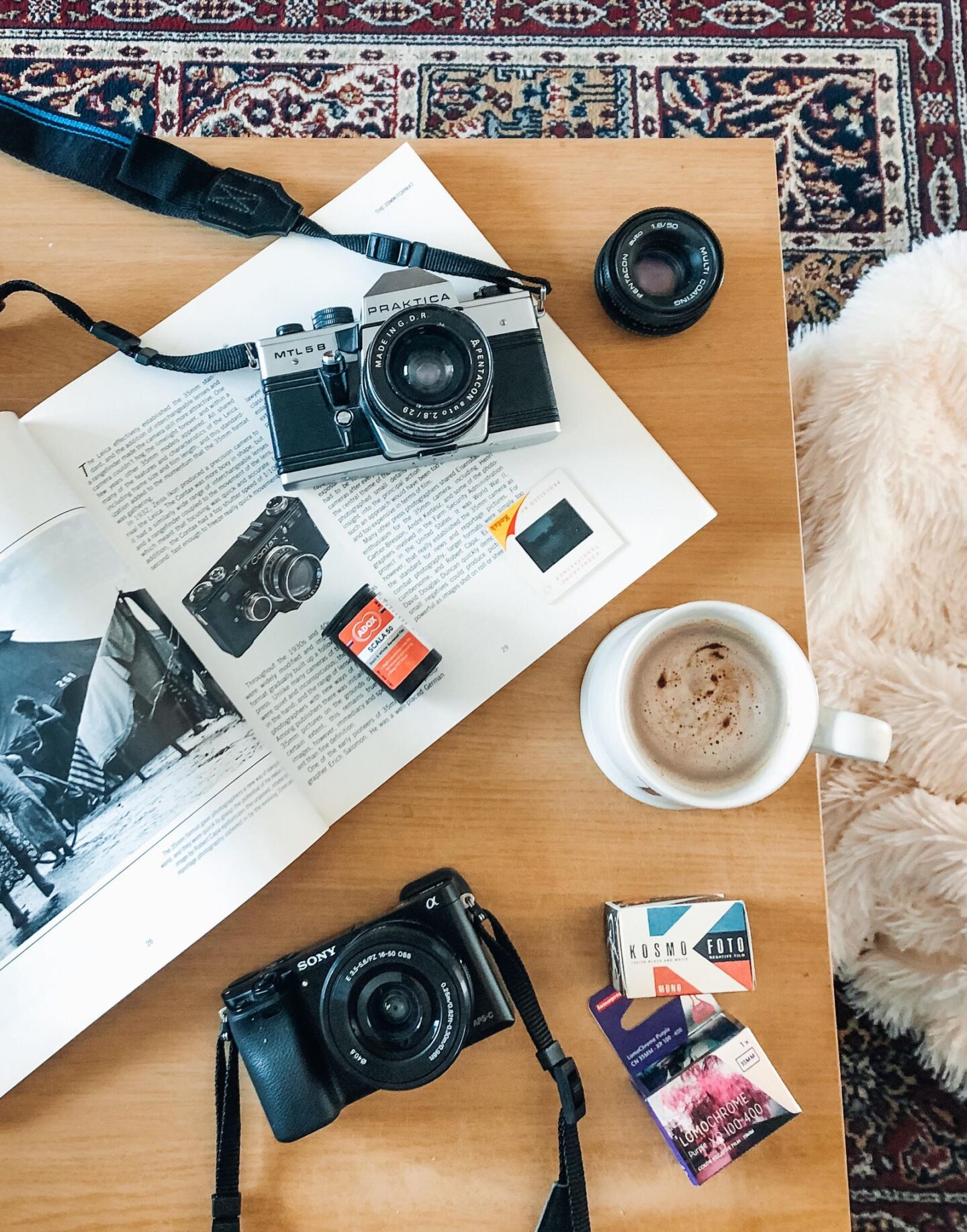 flatlay of digital and film camera