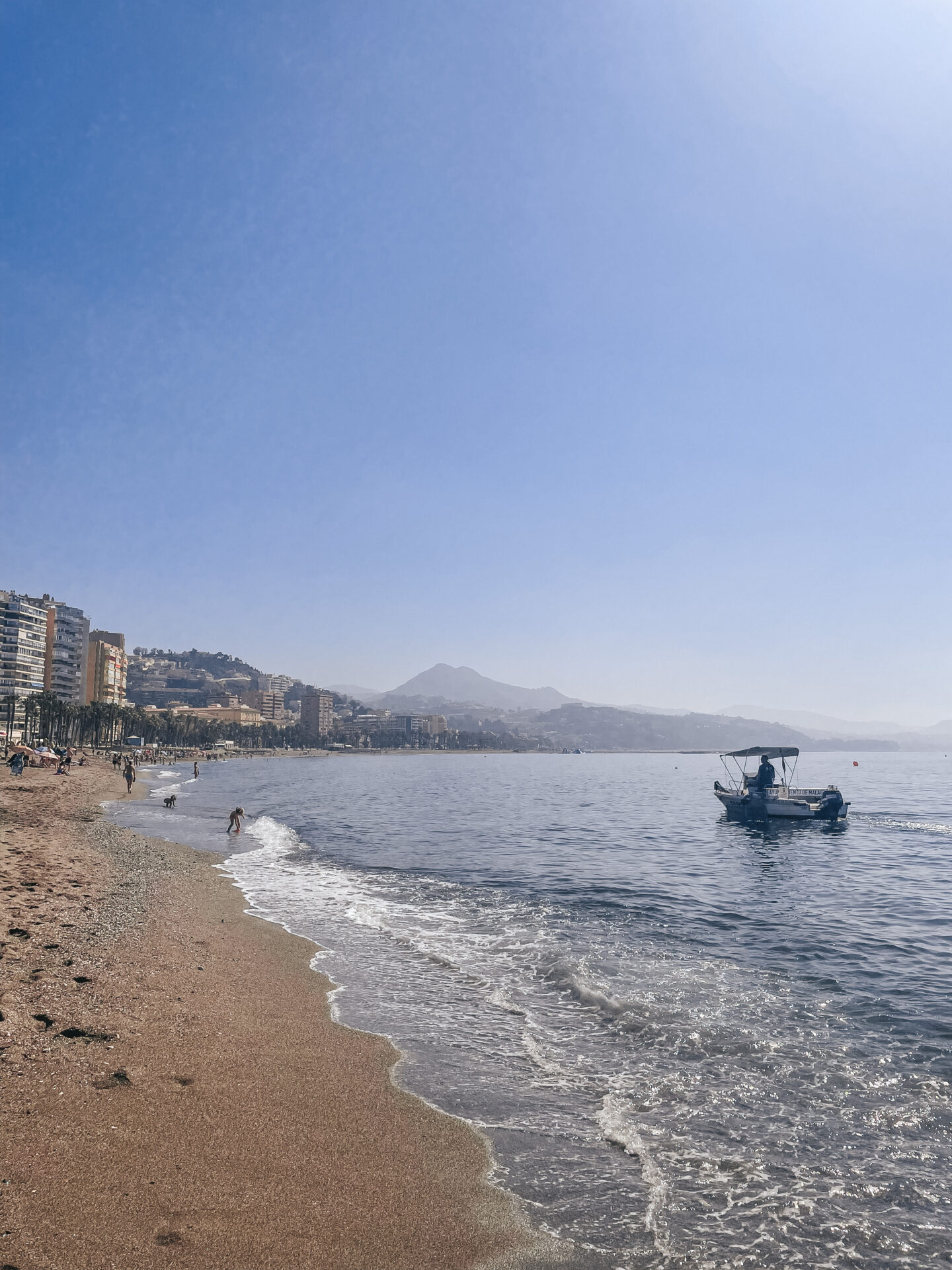 Malaga beach front with mountainous background